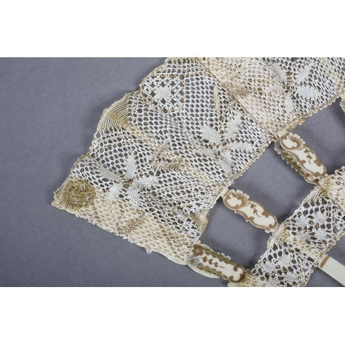 95 - Ann Collier: a cream bobbin lace fan in cabriolet form, the bone monture shaped and lightly gilded, ... 