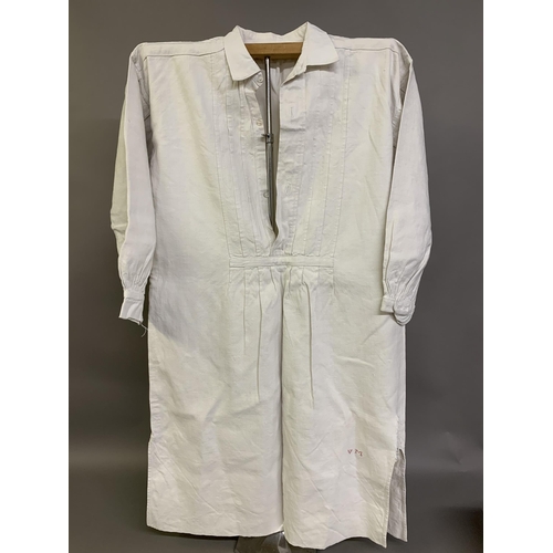 212 - Three French heavy linen gentlemen’s shirts, very long, 19th century, all with long sleeves, cotton ... 