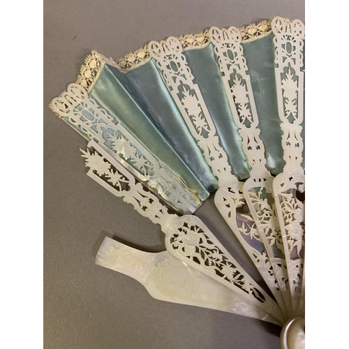 43B - Three 19th century fans, the first a c 1890’s large lace fan with painted gauze panel, the monture o... 