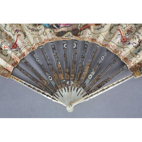 3 - An 18th century French fan c 1775, with straw applied to the silk leaf, forming flowers, painted wit... 