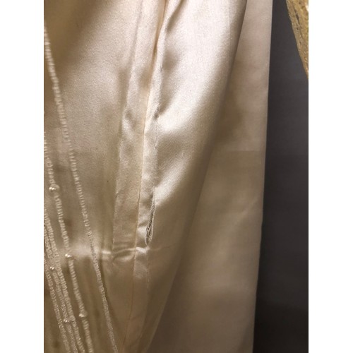 270 - C1920’s ivory silk wedding dress with train, the latter attached from the back of the neck, attracti... 