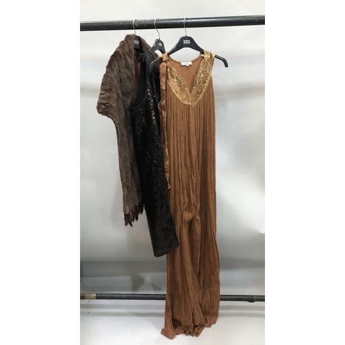 A loose full length crinkle cotton evening dress with satin V front