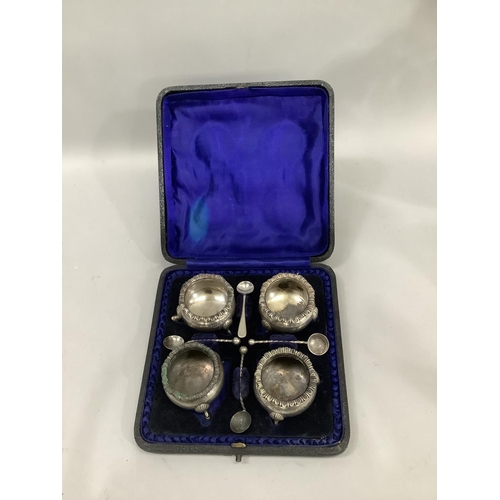 346 - A Victorian four piece silver salt set, each cellar of circular outline, baluster form with ring, th... 