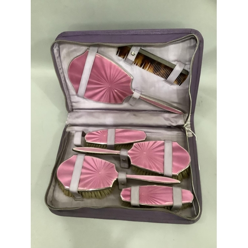 353 - An Edward VIII silver and pink guilloche enamel six piece dressing table set, consisting of two hair... 