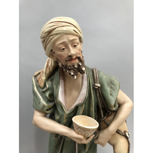 335 - Royal Dux figure, 'Water Carrier', with raised pink triangle mark to base, impressed model number 65... 