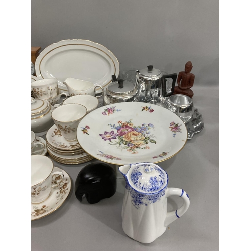 85 - Tea ware, clock, chrome tea service, Buddha, elephant figures etc