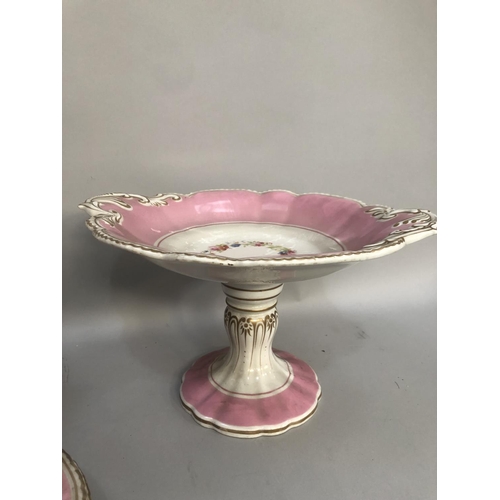 78 - 19th century dessert service, bordered in pink and centered with a garland of printed and enamelled ... 