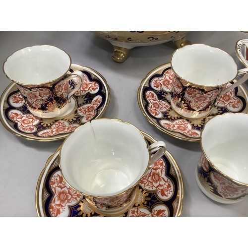 173 - Noritake two handled bowl on four feet enamelled and gilt with peonies on a gilt ground, four Foley ... 