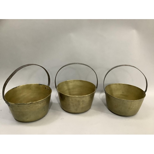 235 - Three brass preserve pans with iron hoop handles