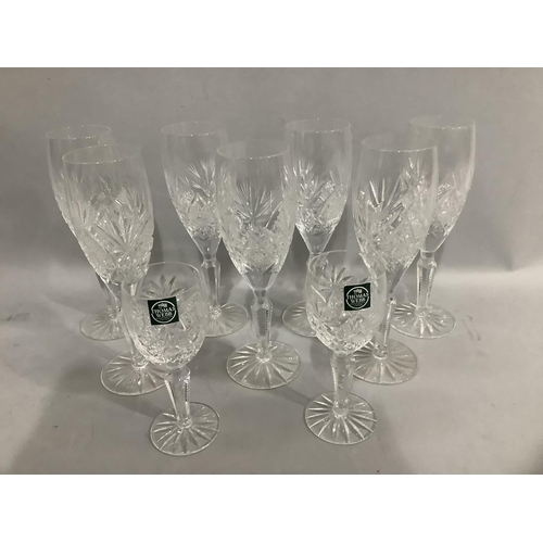 39 - A set of seven Thomas Webb crystal wine glasses and two port glasses, cut bowls and panel stems, on ... 