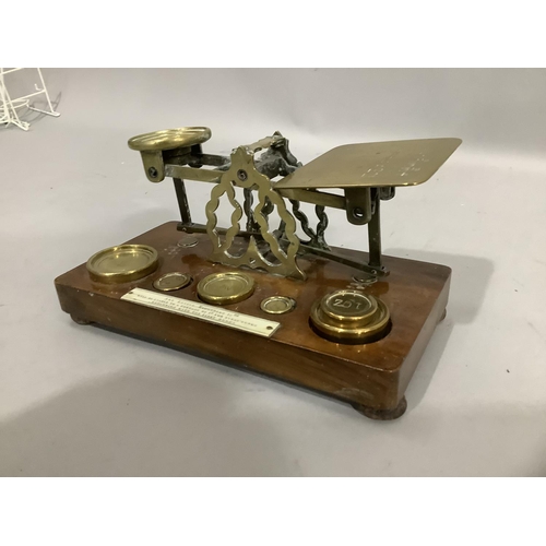 40 - A Victorian set of mahogany and brass postal scales by Samuel Morden and Co with weights and ivory p... 