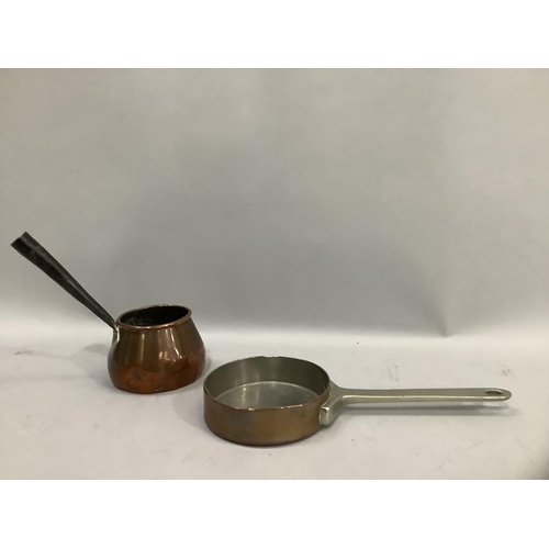 43 - A copper sauce pot with iron side handle, a small copper pan with steel handle, Elkington and Co and... 