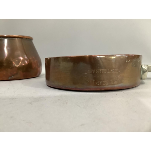 43 - A copper sauce pot with iron side handle, a small copper pan with steel handle, Elkington and Co and... 