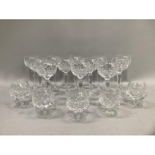 45 - A part suite of crystal table glass comprising twelve hocks and five brandies