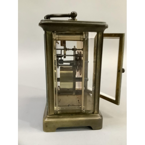 71 - Brass carriage clock with French movement and Roman numeral dial, 14.5cm high