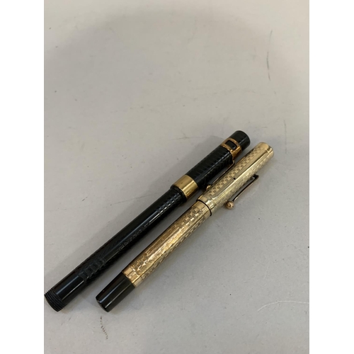 72 - A 'Royal' vintage black cased fountain pen and a vintage rolled gold cased fountain pen both with 14... 