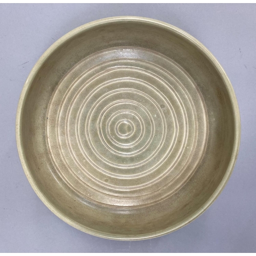 74 - An early Susie Cooper bowl, circular with ribbed sides, the well incised with concentric circles and... 