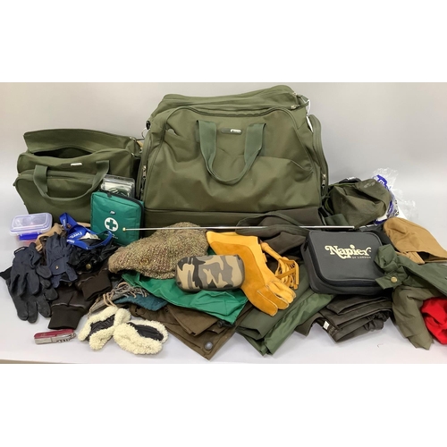 98 - Two canvas bags by Baretta cont., a wide selection of shooting equipment and ancillary clothing suit... 