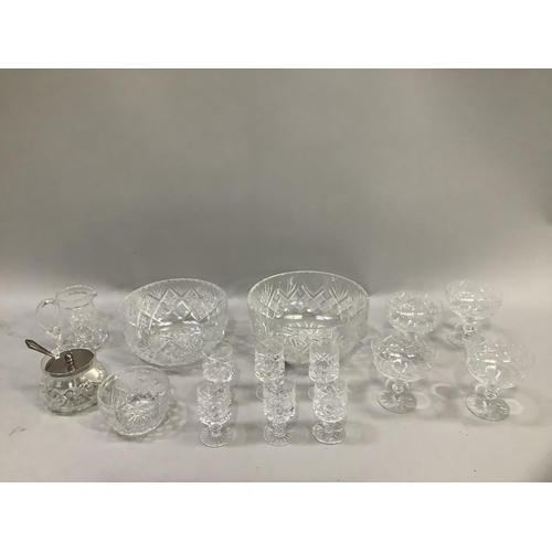 46 - Two crystal serving bowls, five Champagne coupes, preserve pot, sugar and cream, six liqueur glasses