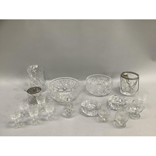 47 - Items of cut glass including two crystal serving bowls, water jug, ice pale, preserve pot, table bel... 