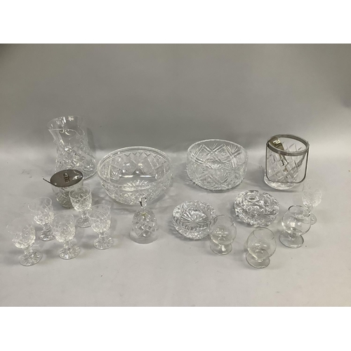 47 - Items of cut glass including two crystal serving bowls, water jug, ice pale, preserve pot, table bel... 