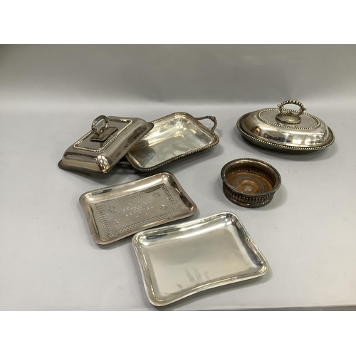 48 - Two silver plated entree dishes and covers of rectangular and oval outline together with a wine coas... 