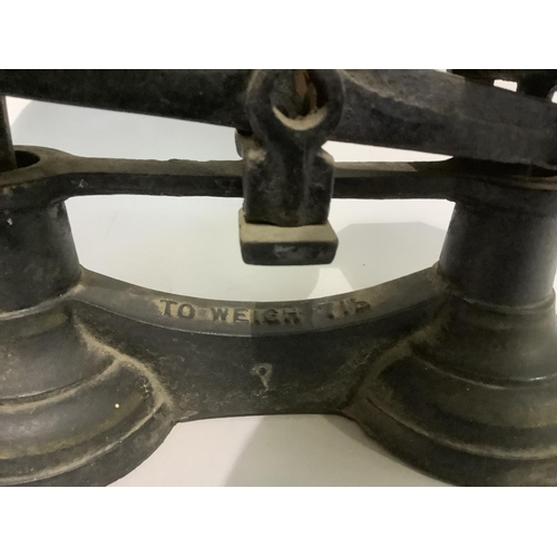 283 - A set of weighing scales with weights