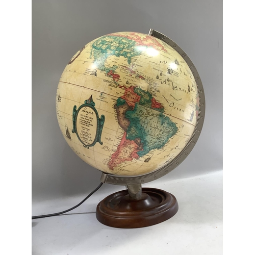 326 - A reproduction globe on wooden base