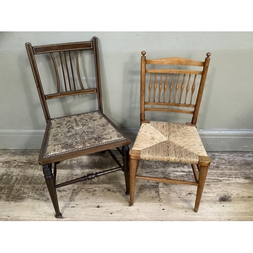 534 - One beech spindle back, rush seated child's chair together with an Edwardian crossband inlay mahogan... 