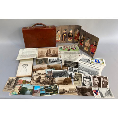 312 - A leather and card suitcase containing postcards of Robin Hood's Bay, Whitby and other East Coast vi... 