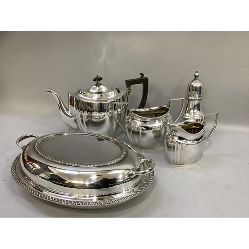 242 - A silver plated three piece tea service, a sugar caster and an entree dish and cover with gadroon ri... 