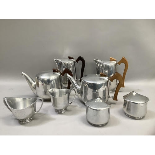 245 - Quantity of Picquot ware to include two hot water pots, two teapots, twin handled sugar bowl, milk j... 