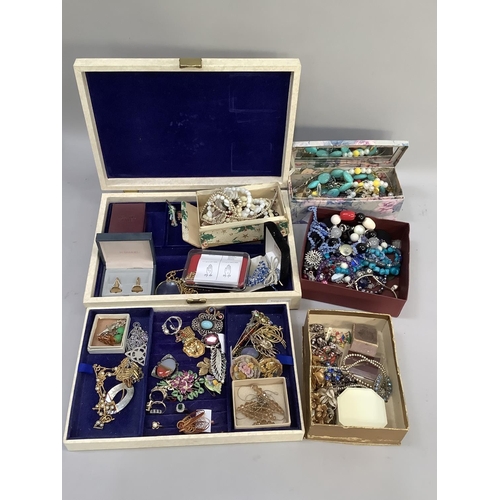 384 - A collection of costume jewellery including necklaces, brooches, cufflinks etc all in base metal var... 