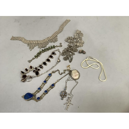 388 - A collection of silver and white metal jewellery variously set with garnet, pendant, sodalite, paste... 