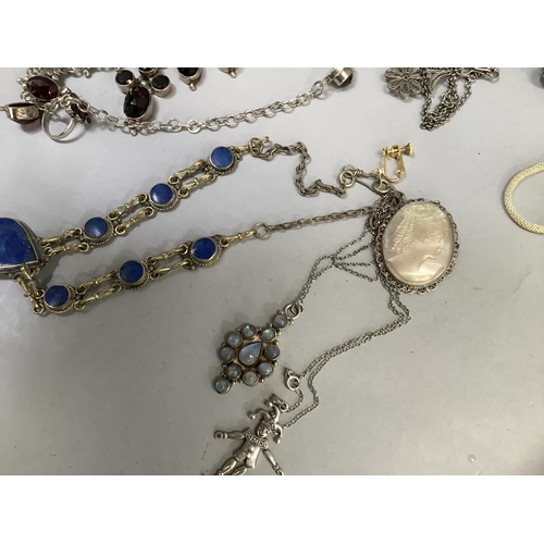 388 - A collection of silver and white metal jewellery variously set with garnet, pendant, sodalite, paste... 