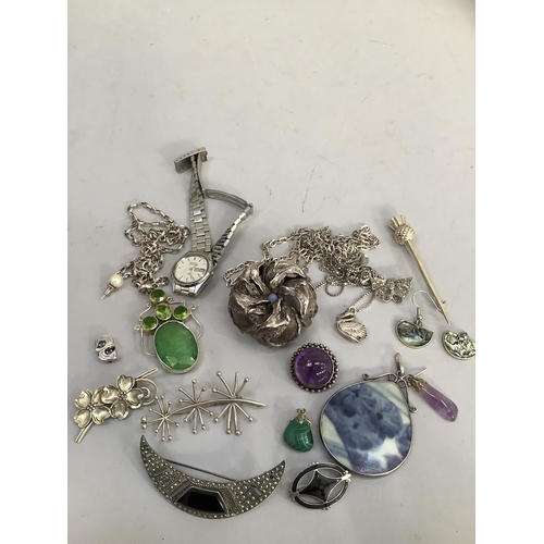 404 - A collection of silver and white metal jewellery (test as silver) including a chrysanthemum bead pen... 