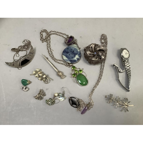 404 - A collection of silver and white metal jewellery (test as silver) including a chrysanthemum bead pen... 