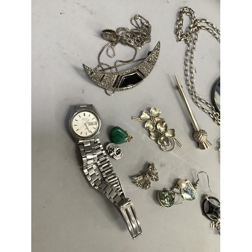 404 - A collection of silver and white metal jewellery (test as silver) including a chrysanthemum bead pen... 