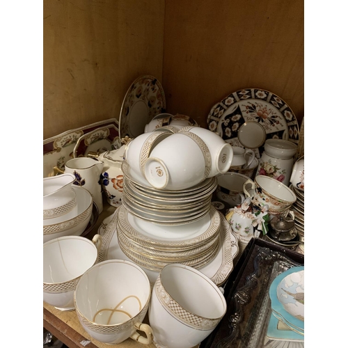 104 - Quantity of china ware to include cups, saucers, side plates, large serving dish, cake plate, blue a... 