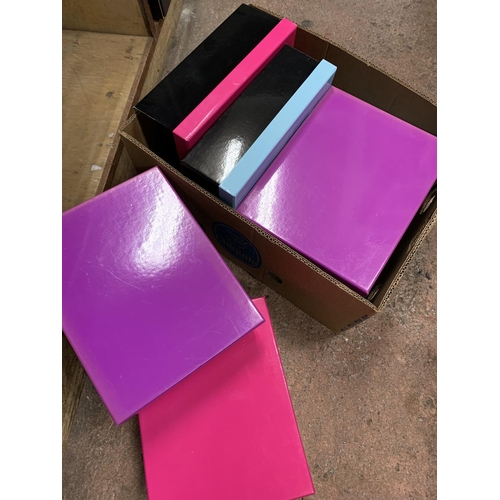 108 - Quantity of brightly coloured storage boxes together with glass tea light holders (qty)