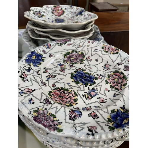 250 - Quantity of 19th century tableware decorated in geometric patterns with blue, purple and pink flower... 