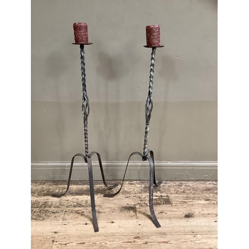 265 - A pair of metal twisted candle stands