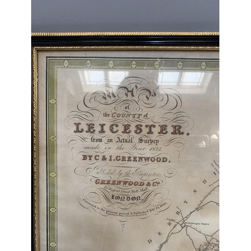 297 - A map of the County of Leicester by C and I Greenwood, 1825, double page with vignette of Belvoir Ca... 