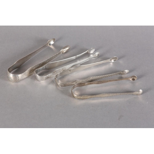 281 - A PAIR OF SCOTTISH SILVER BRIGHT CUT SUGAR TONGS c.1790 together with three other pairs of silver to... 