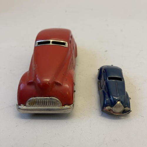 107 - A 1950s Wells Wonder Car clockwork tinplate saloon and a Minic LB Ltd miniature clockwork coupe.