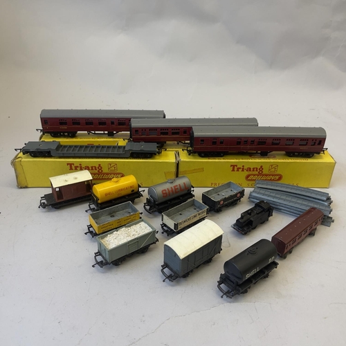 116 - A collection of Tri-ang TT Gauge carriages and rolling stock, including two T82 Mainline Composite C... 