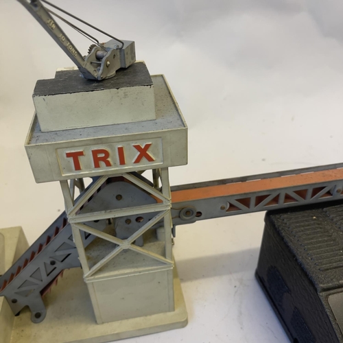 120 - A large Trix Manyways Mainline Terminus Station building, die cast and tin plate, along with a quant... 