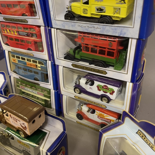 50 - A collection (15) of Oxford Die Cast scale models, including four Routemaster double decker buses (b... 