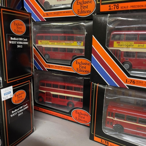 55 - A collection of 17 Exclusive First Editions die cast models of buses, coaches and trams all carrying... 