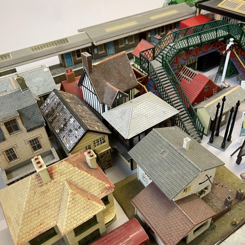 6 - An extensive collection of 00 gauge plastic, card and cast-metal trackside buildings and accessories... 